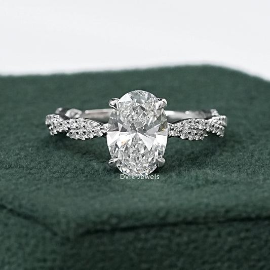 Twist Shank Oval Accent Diamond Ring