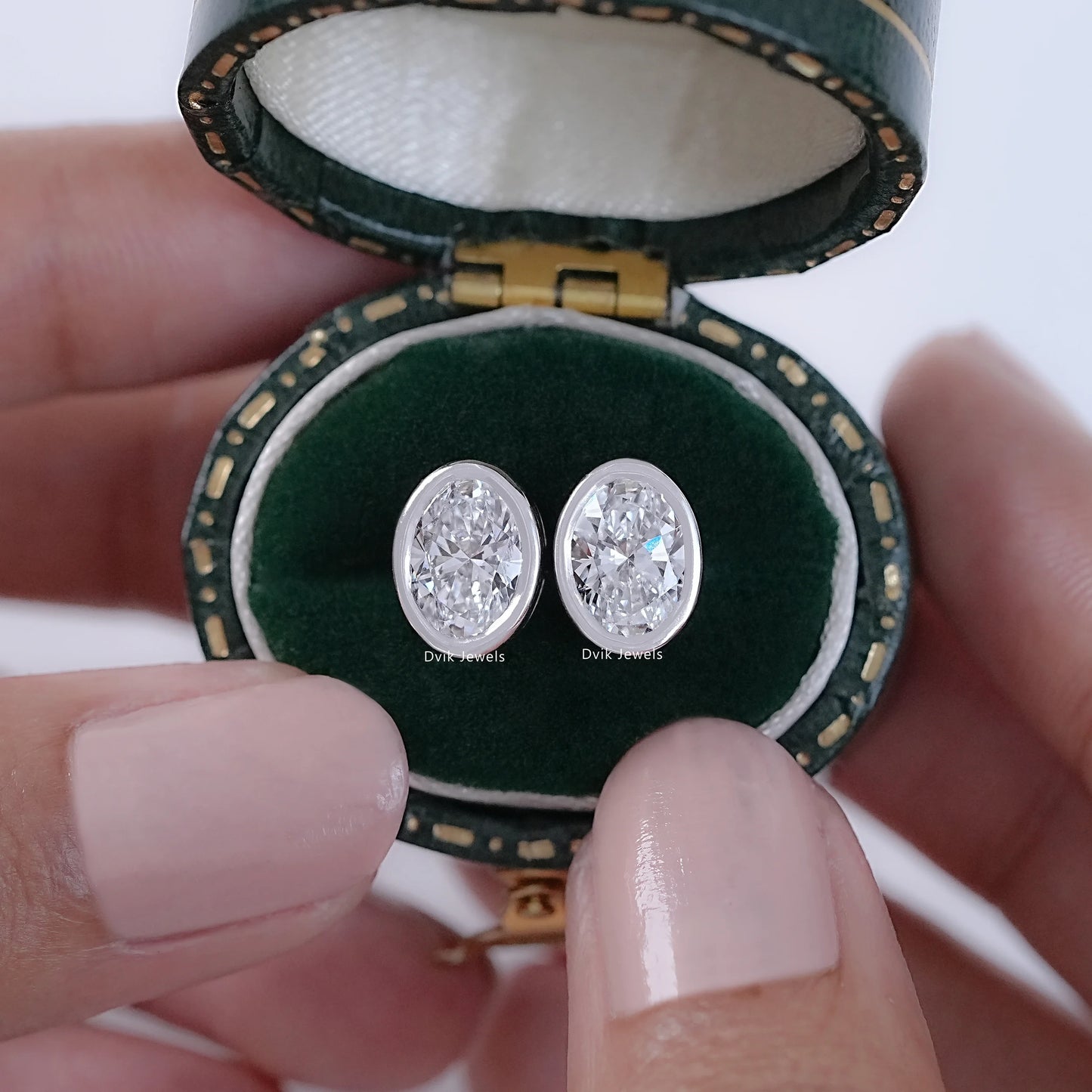 Oval Cut Lab Diamond Bezel Set Stud Earrings