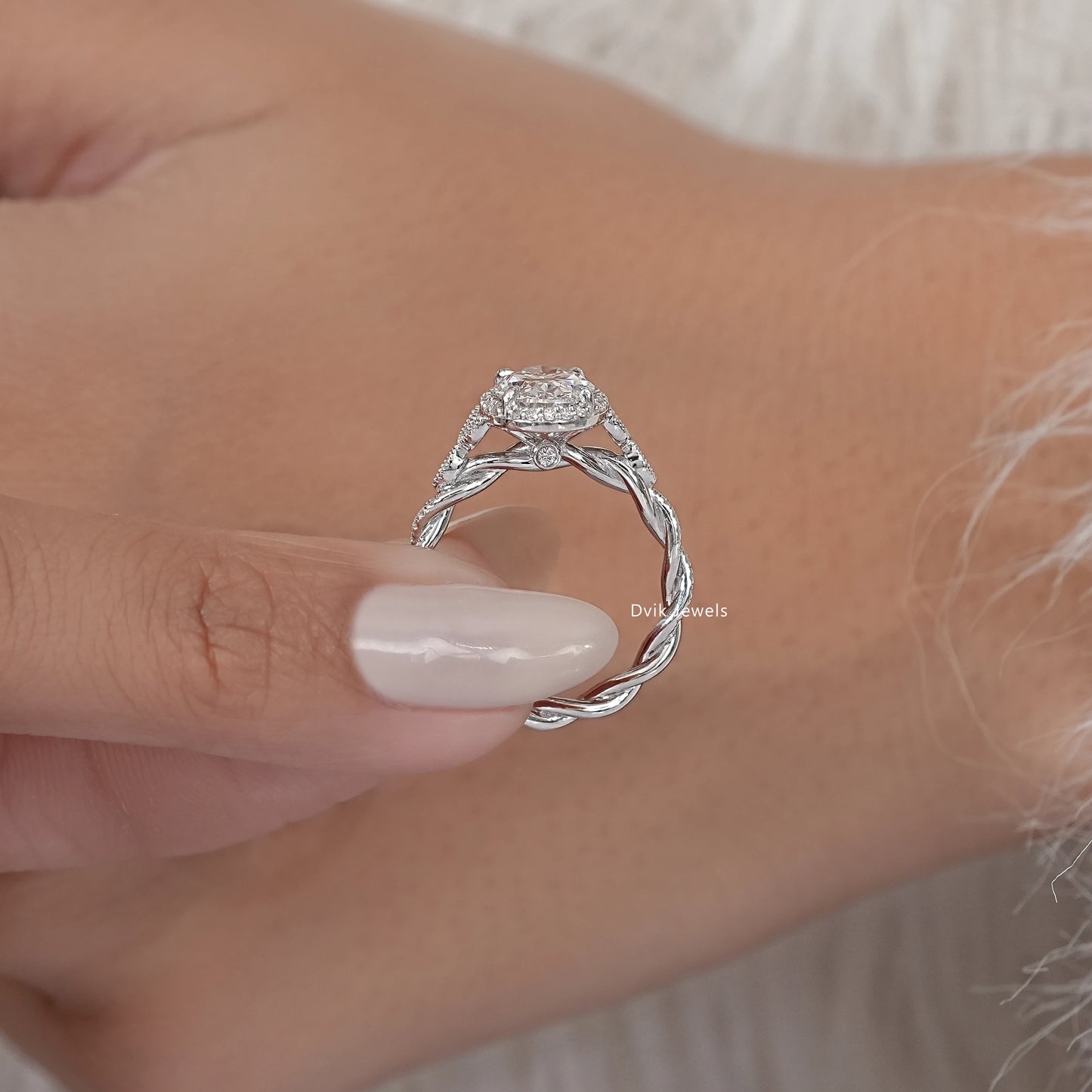 Oval Cut Accent Diamond Twisted Halo Ring