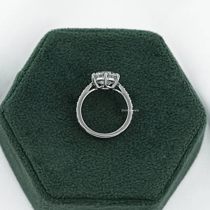 Pave set engagement ring featuring a solitaire vintage mine cut diamond