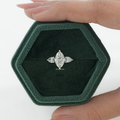 Marquise Cut Lab Diamond Three Stone Engagement Ring displayed in jewelry box with front view