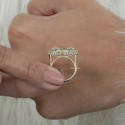 Pave diamond band with marquise diamond center stone held between fingers to show clarity