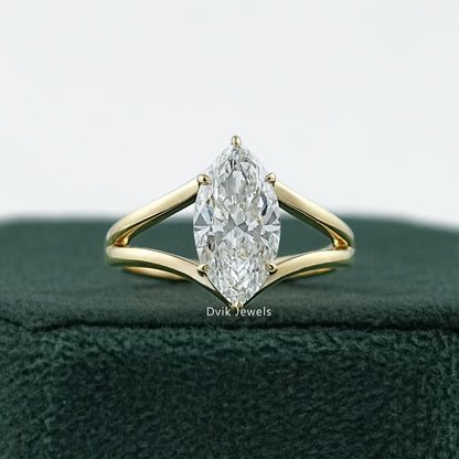 Split shank engagement ring marquise held to show the unique double band
