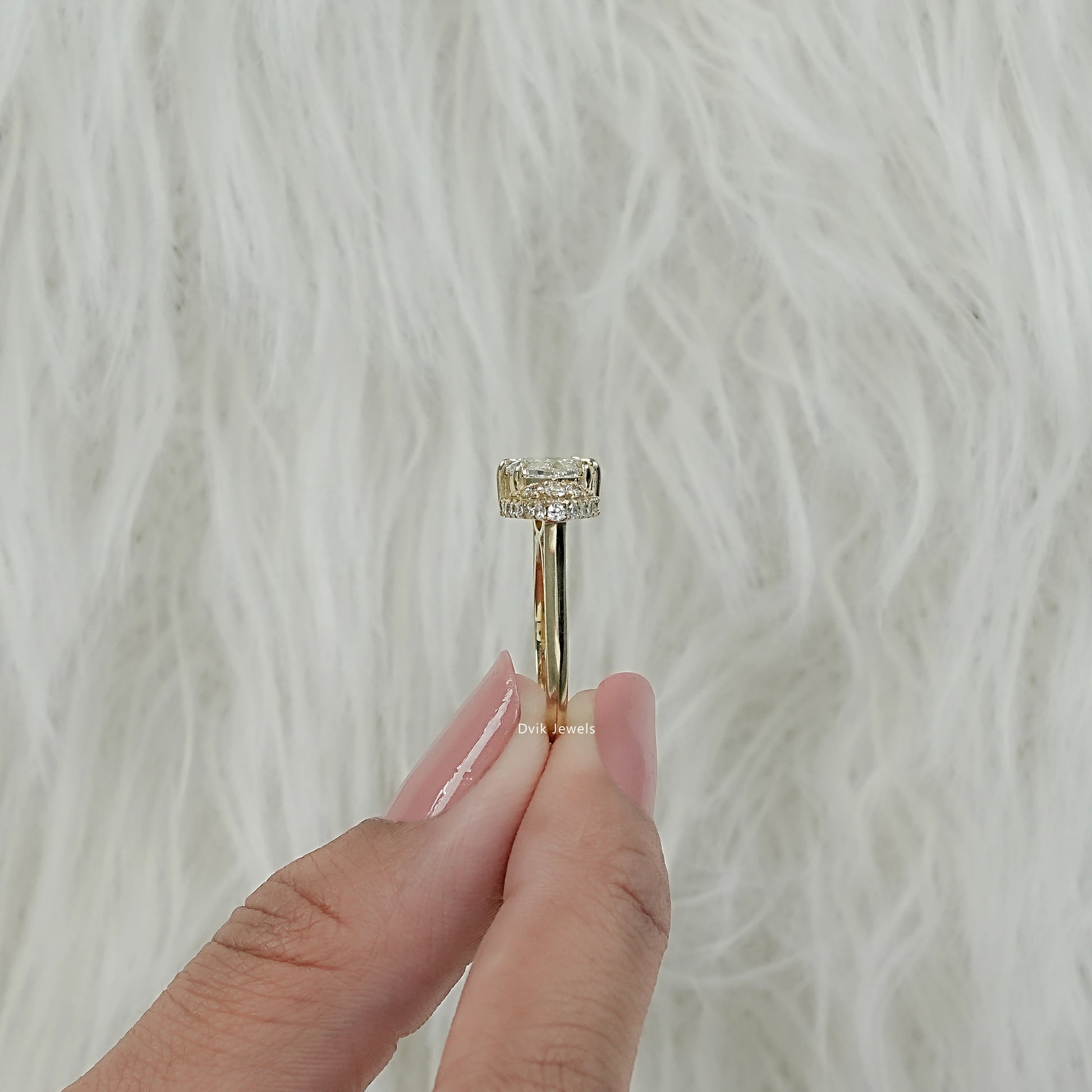 Marquise pave diamond engagement ring showing brilliance of the stone and pave detailing