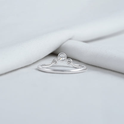 Curved bezel trilogy rings with sparkling lab diamonds in white gold.