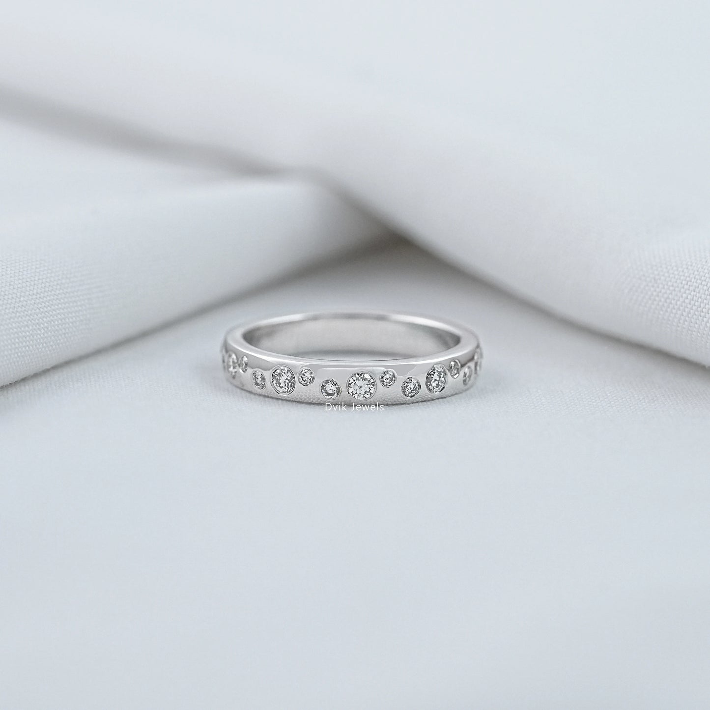 Round Cut Diamond Scattered Bezel Set Wedding Band