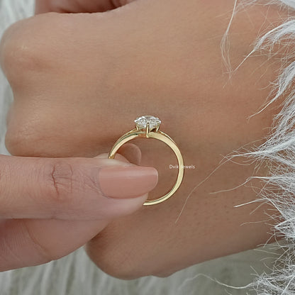 Marquise cut lab grown diamond engagement ring close-up on a luxury base