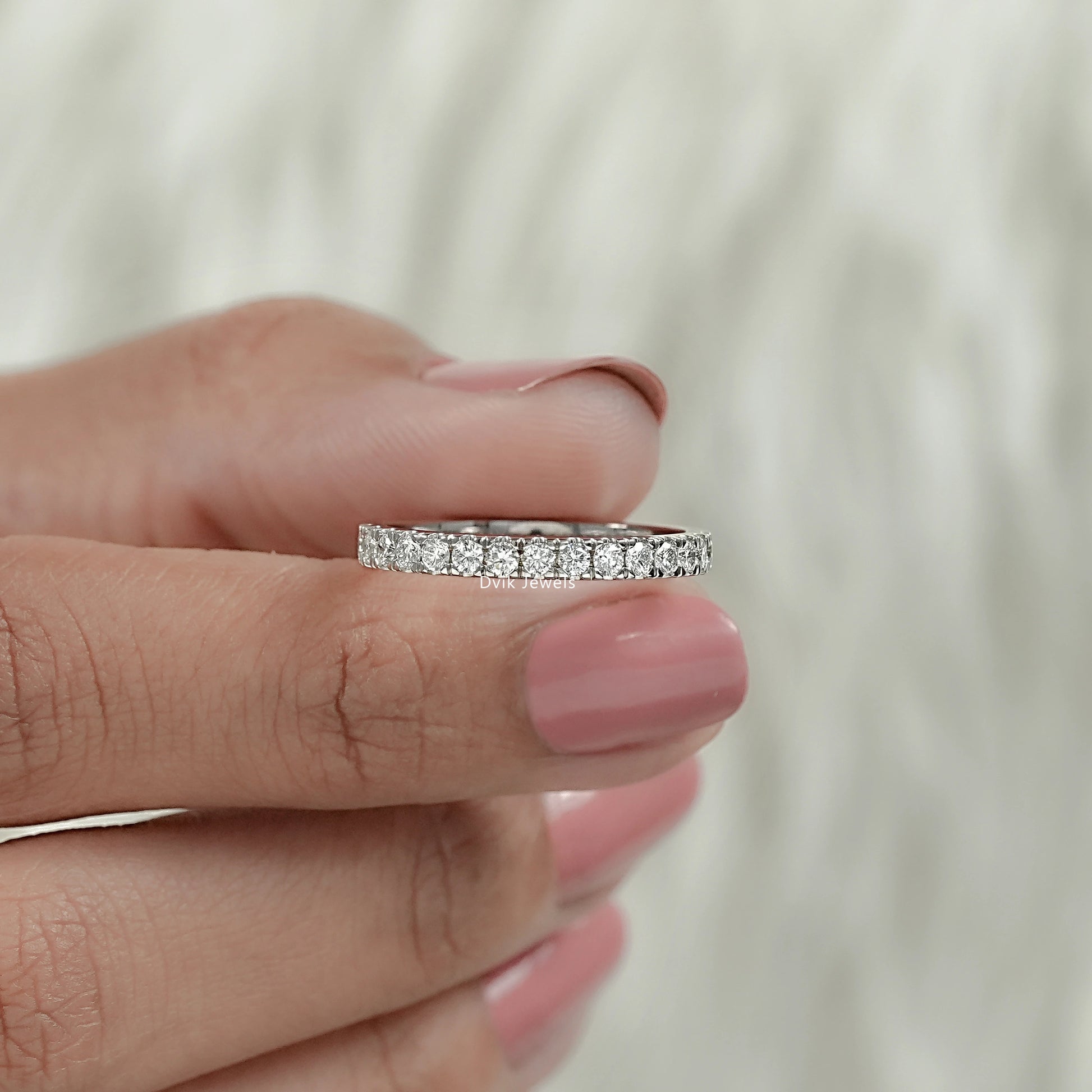 Round half eternity band with slim pave setting in white gold