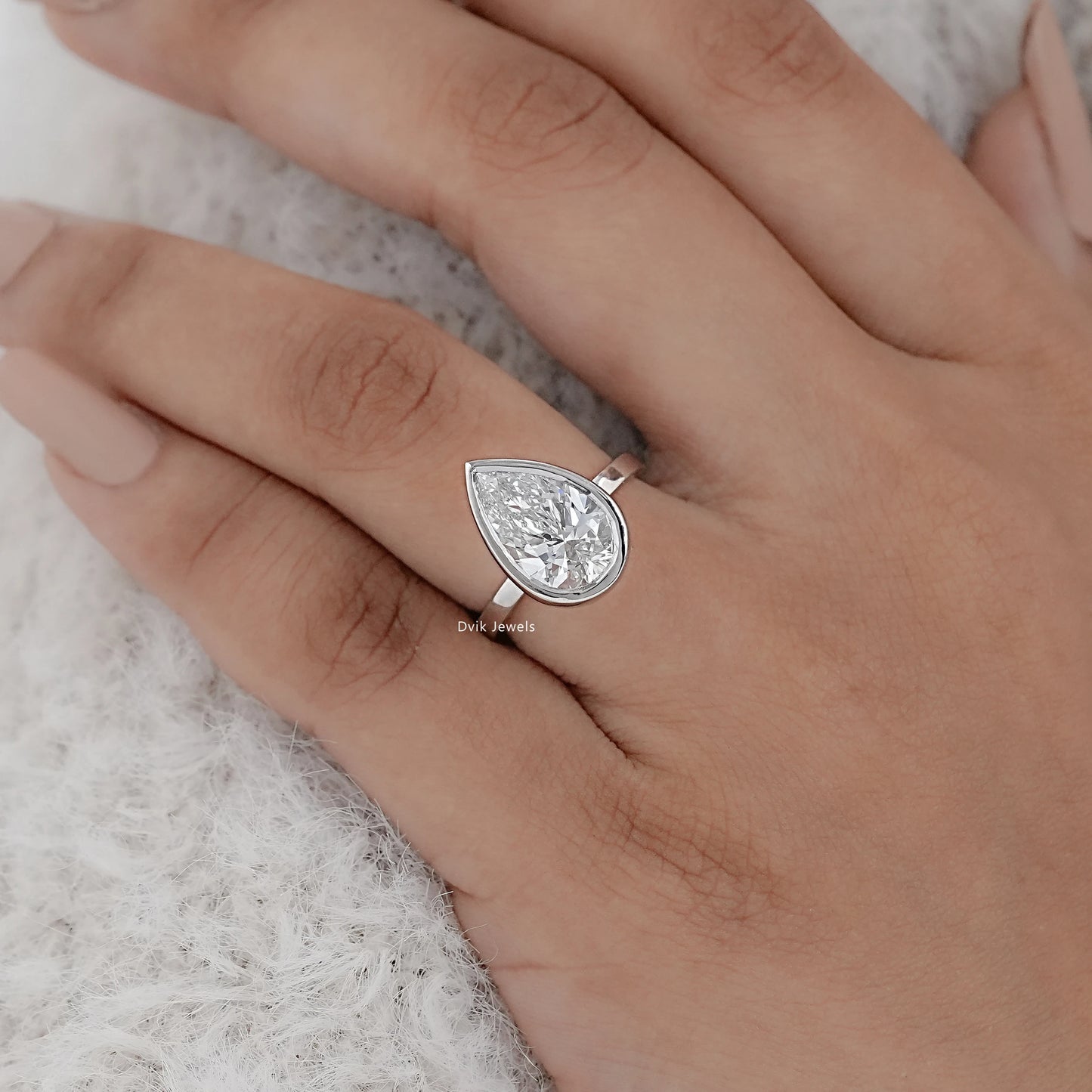 Bezel Set Pear Cut Diamond Ring