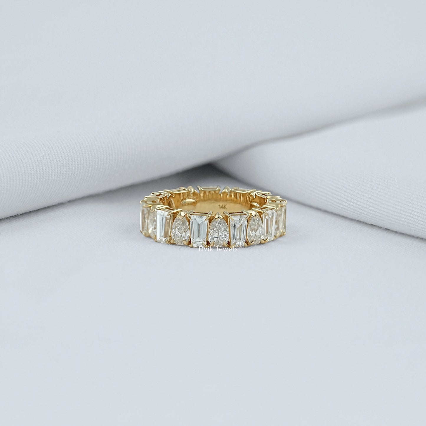 Pear And Tapered Baguette Diamond Eternity Band
