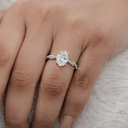 Twist Shank Oval Accent Diamond Ring