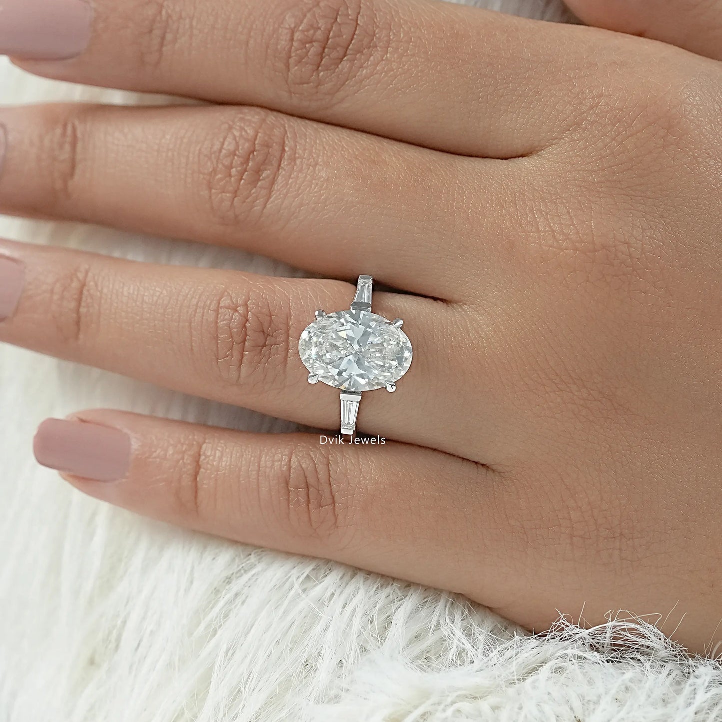 Angled hand view of oval lab diamond engagement ring for our USA bridal jewelry market.