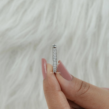 Side profile of open cuff diamond ring with diamond princess cut showing the secure prong settings