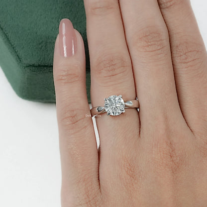 Round Brilliant Cut Lab Grown Diamond Solitaire Engagement Ring styled on hand