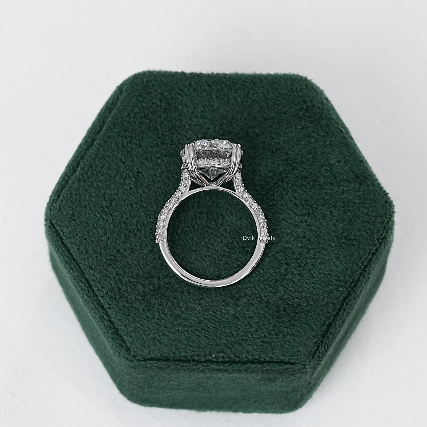 Round Cut Hidden Halo Engagement Ring with Pave Band