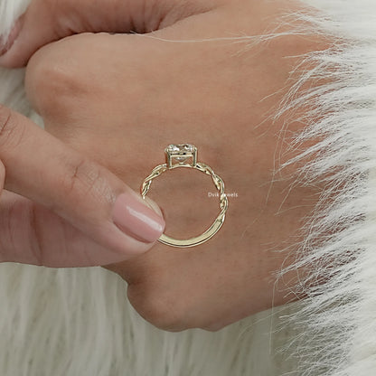 Round Cut Solitaire Engagement Ring with Twisted Diamond Band