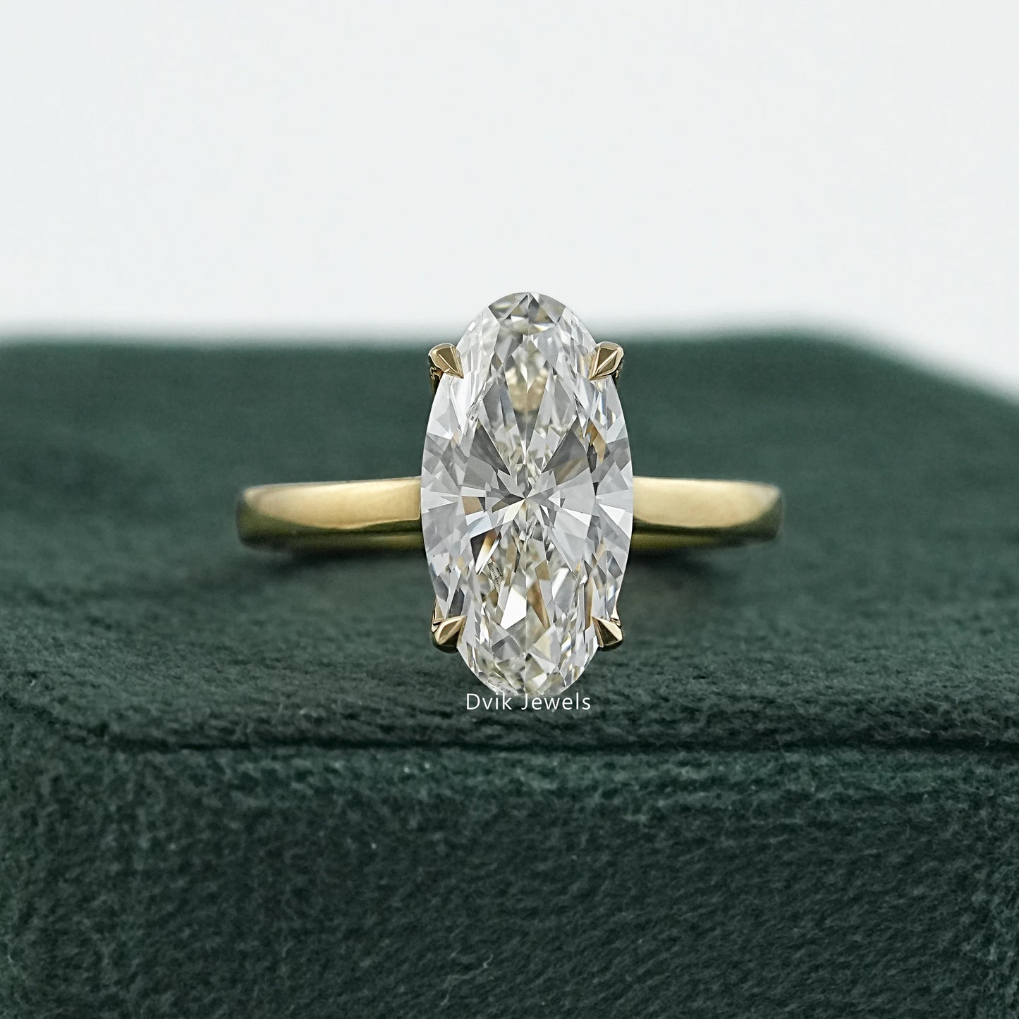 Dvik Jewels' hidden halo moval cut lab diamond engagement ring online in USA