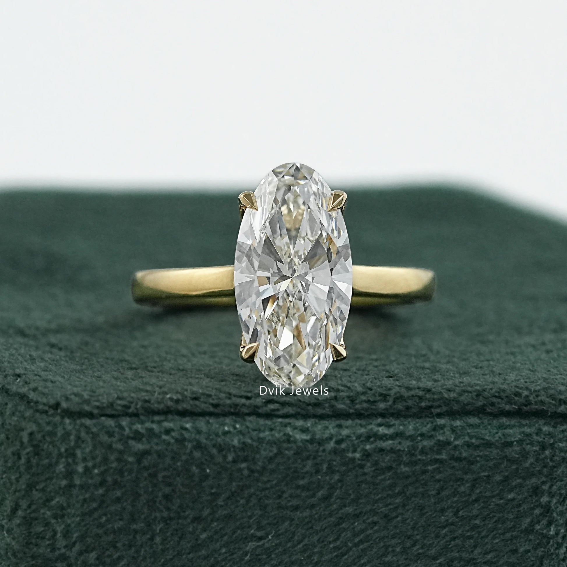 Dvik Jewels' hidden halo moval cut lab diamond engagement ring online in USA