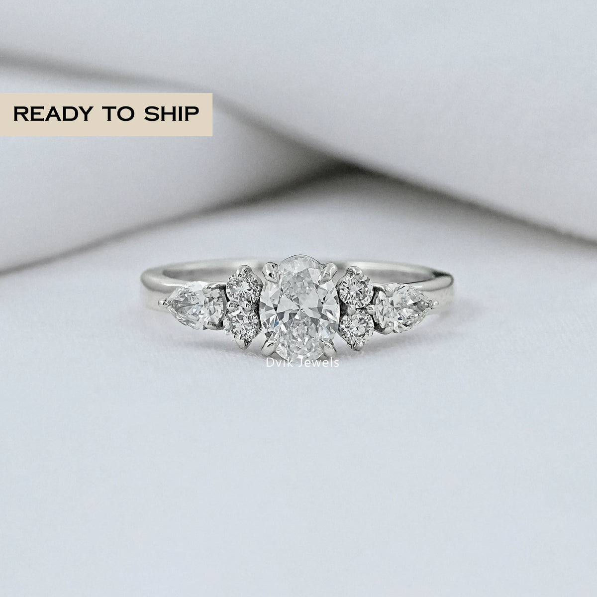 Oval And Pear Diamond Seven Stone Ring