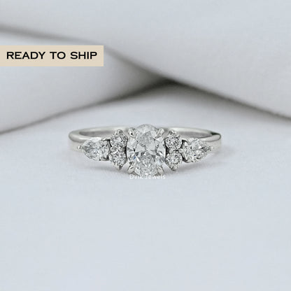 Oval And Pear Diamond Seven Stone Ring