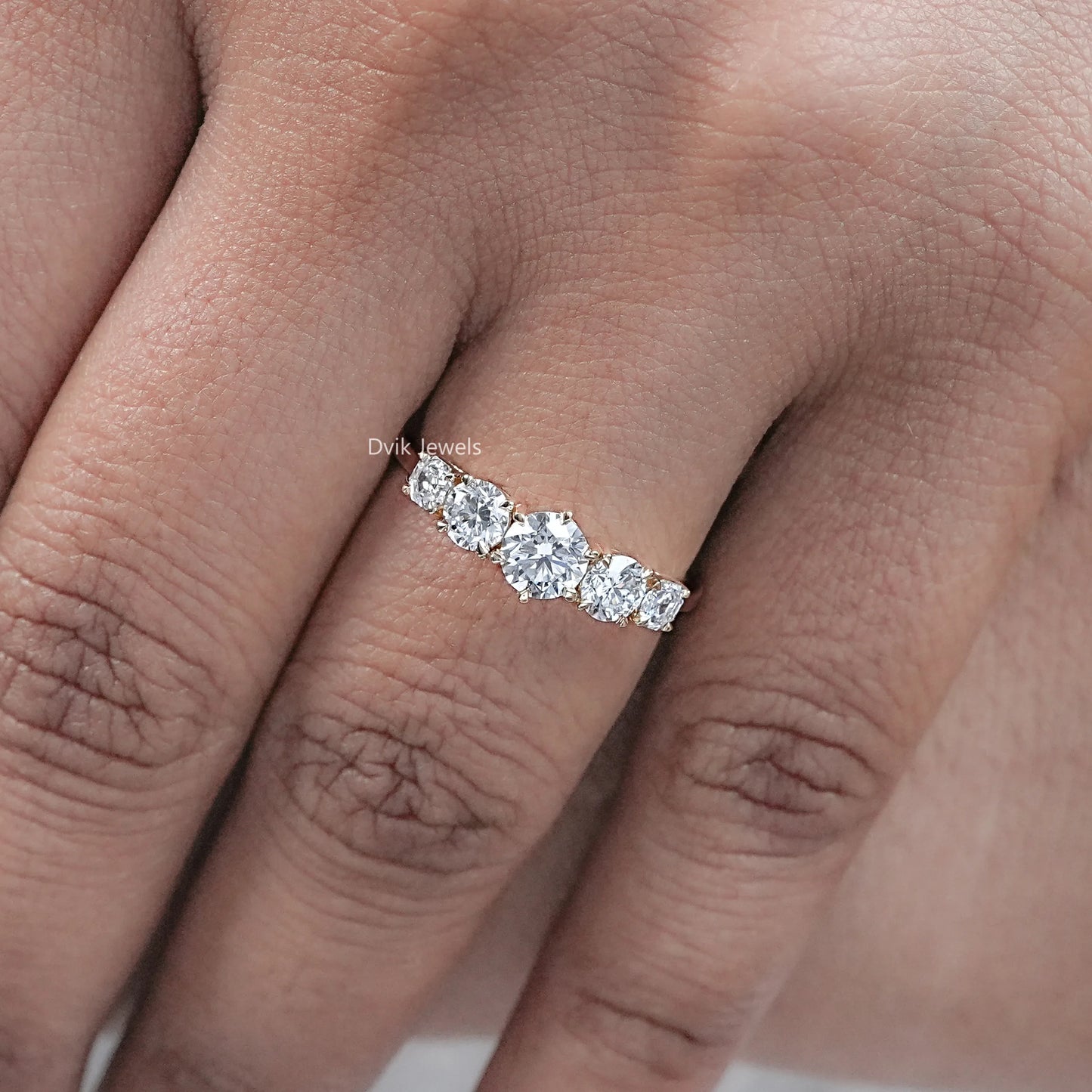 Octagon And Round Diamond Five Stone Ring