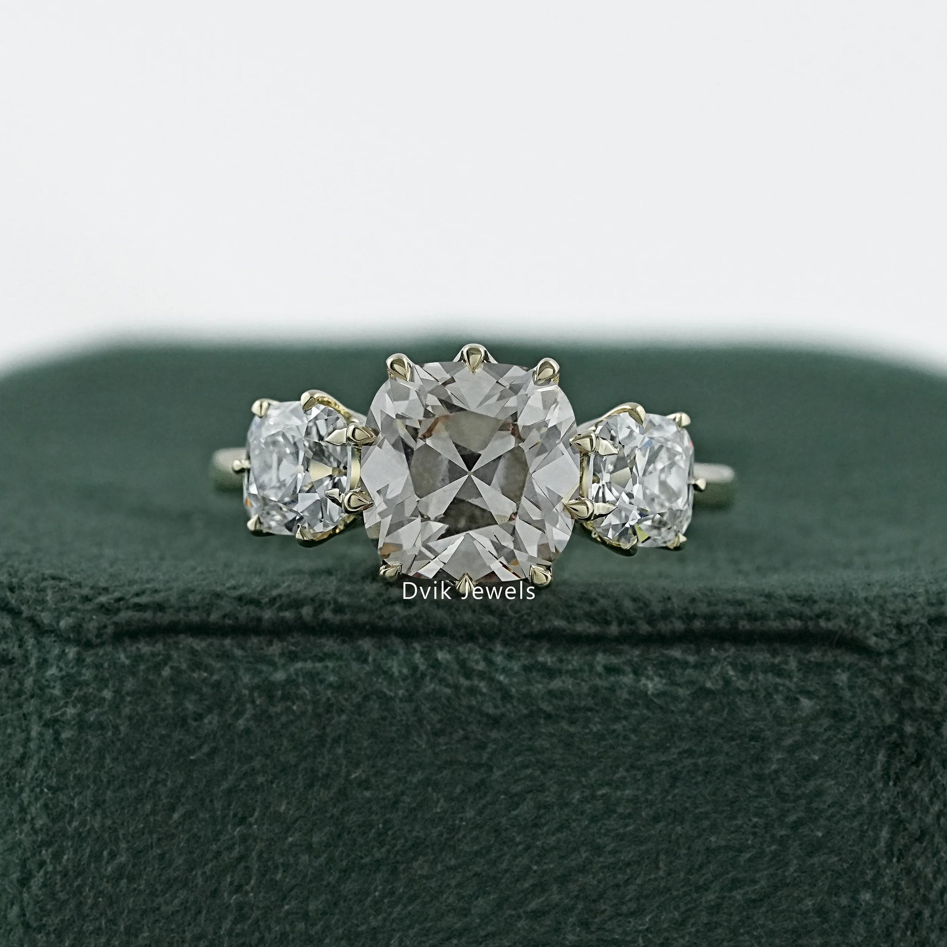 Old mine diamond engagement ring in a vintage 14k gold claw setting.