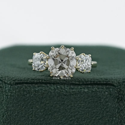 Old mine diamond engagement ring in a vintage 14k gold claw setting.