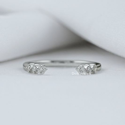 open gap wedding band by Dvik Jewels in a green velvet box angle view