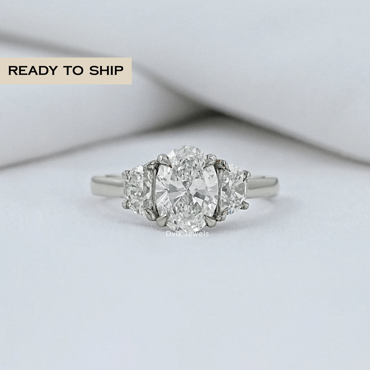 Oval And Half Moon Diamond Three Stone Ring