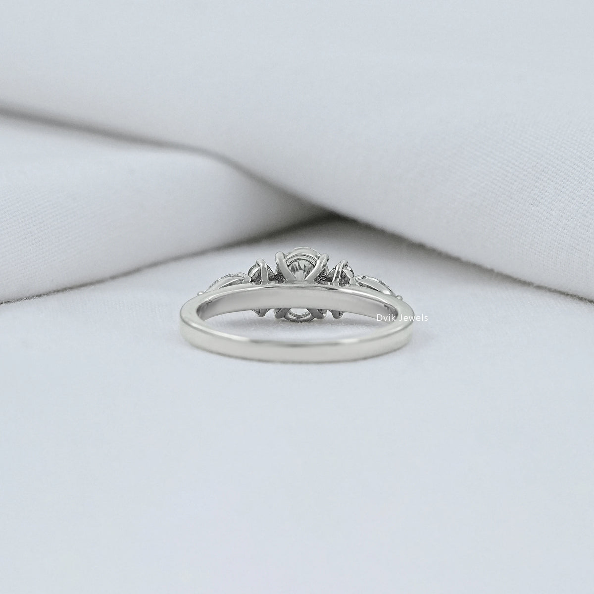 Oval And Pear Diamond Seven Stone Ring
