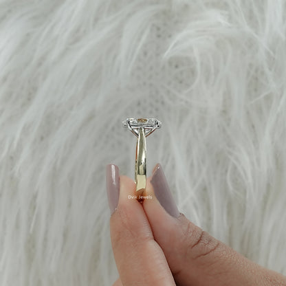 Side view of an Oval Cut Wedding Ring for shoppers in USA market, sitting flush on the hand.