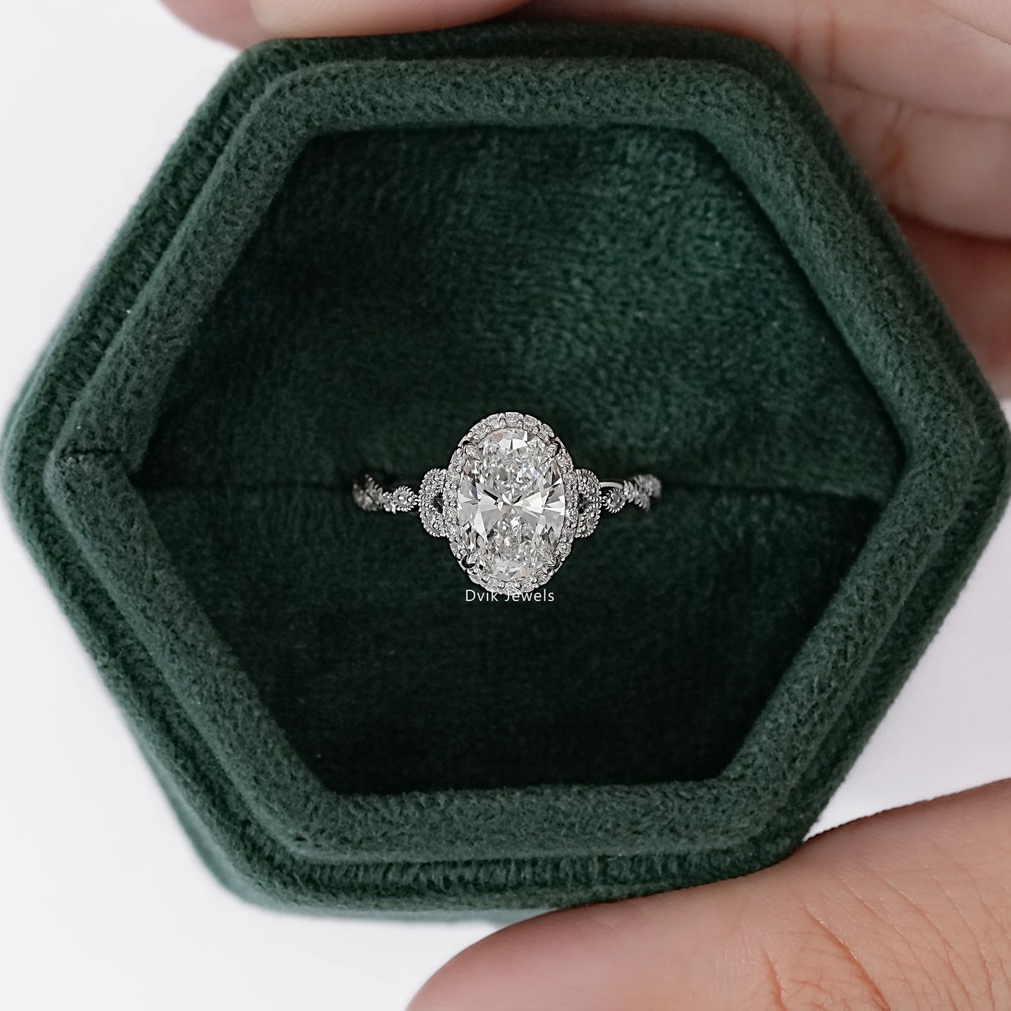 Oval Cut Accent Diamond Twisted Halo Ring