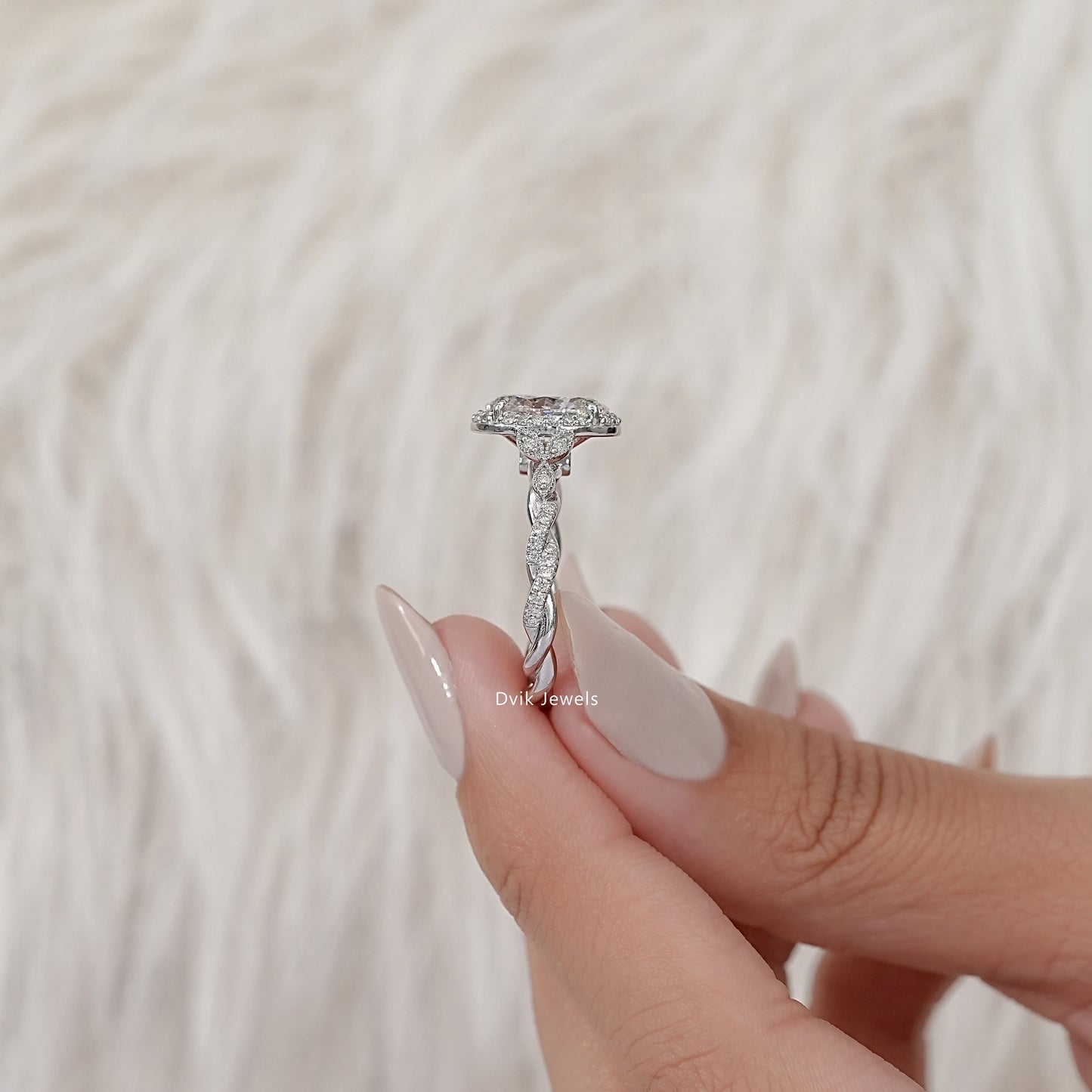 Oval Cut Accent Diamond Twisted Halo Ring