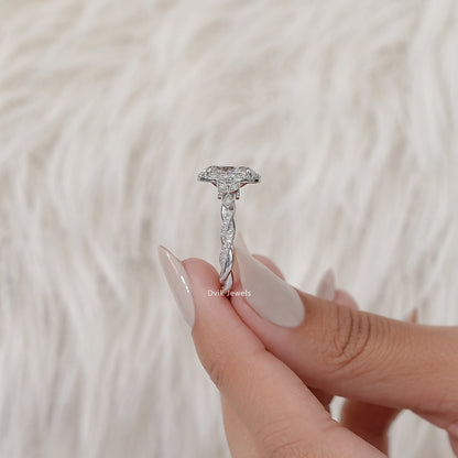Oval Cut Accent Diamond Twisted Halo Ring