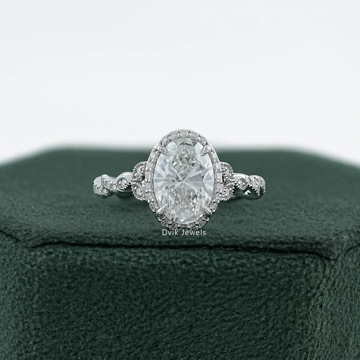 Oval Cut Accent Diamond Twisted Halo Ring