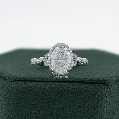 Oval Cut Accent Diamond Twisted Halo Ring
