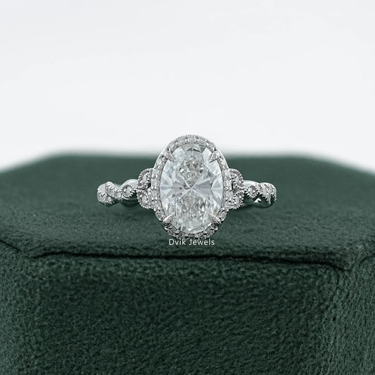 Oval Cut Accent Diamond Twisted Halo Ring