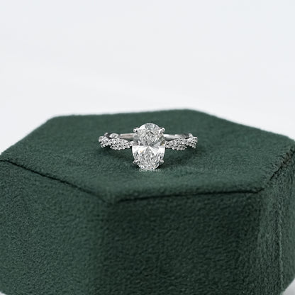 Twist Shank Oval Accent Diamond Ring