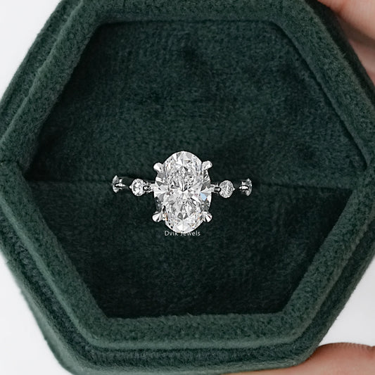 Oval Cut Side Diamond Accent Engagement Ring