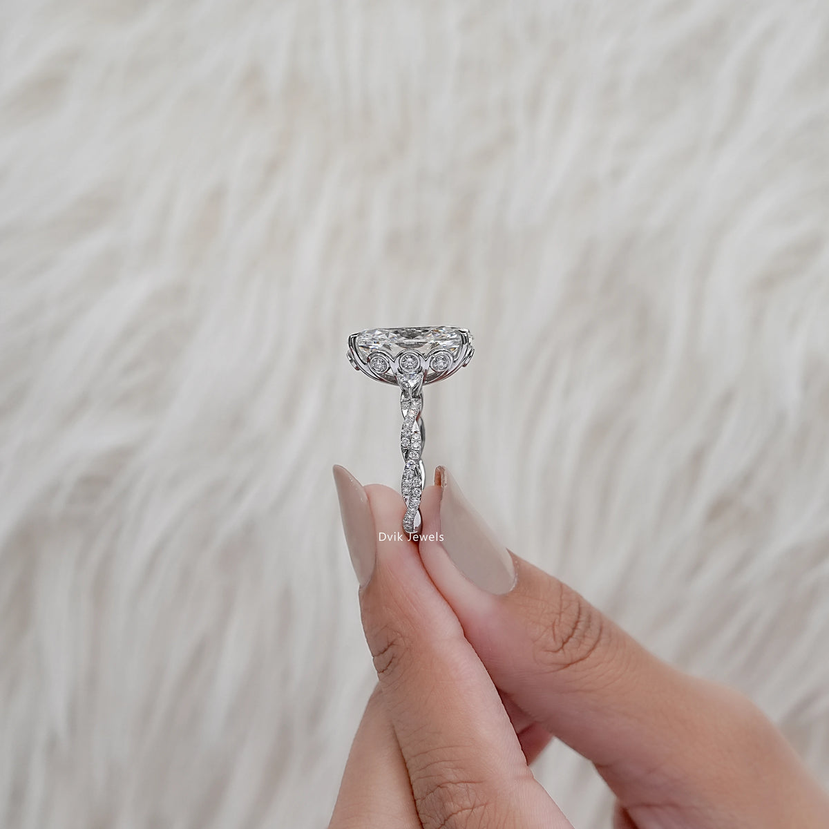Oval Cut Diamond Twisted Hidden Halo Ring