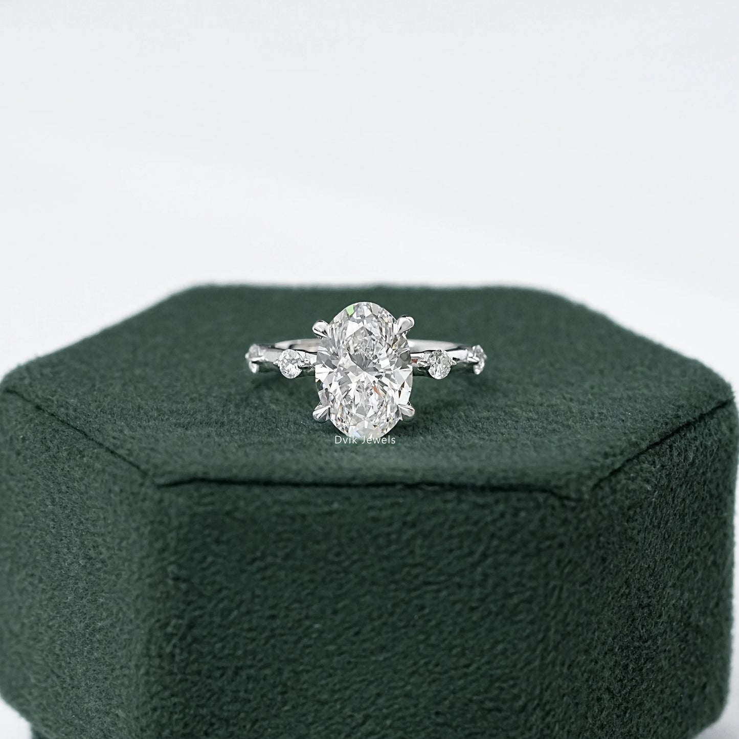 Oval Cut Side Diamond Accent Engagement Ring