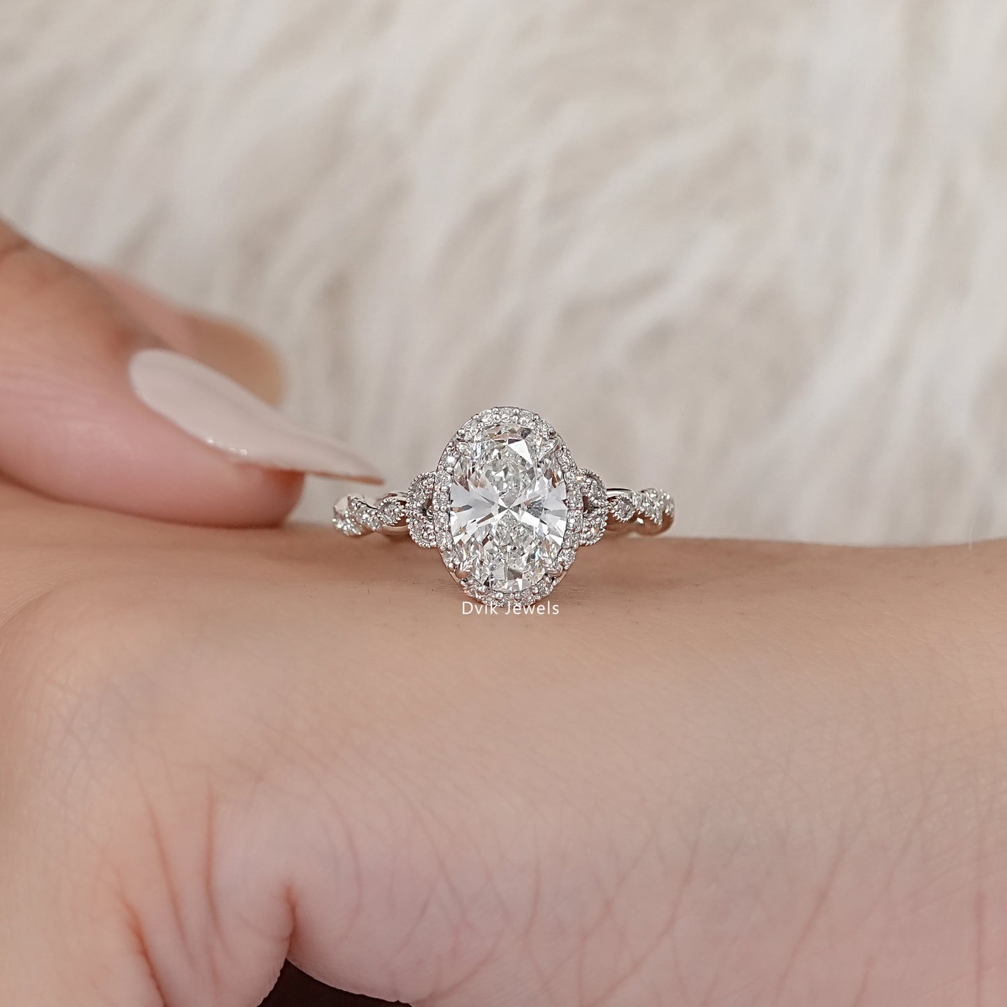 Oval Cut Accent Diamond Twisted Halo Ring