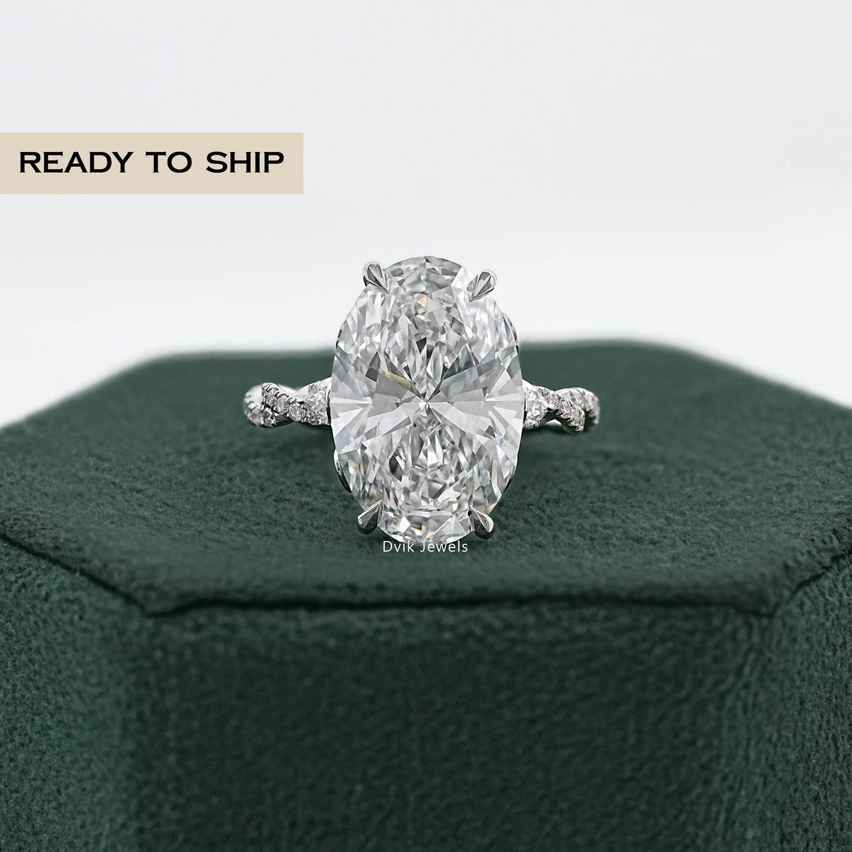 Oval Cut Diamond Twisted Hidden Halo Ring