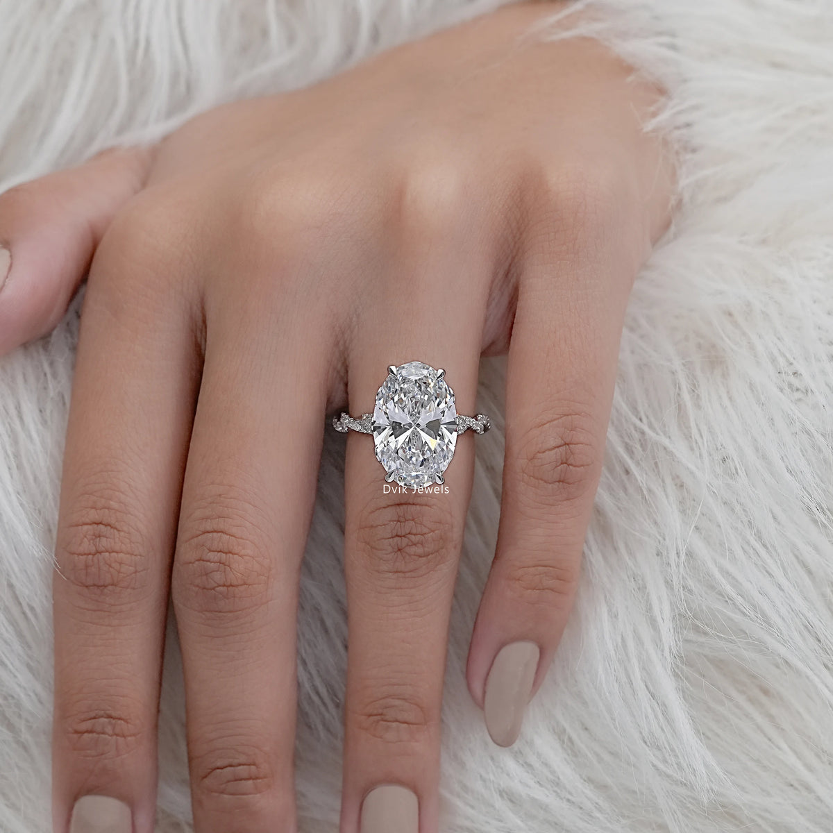 Oval Cut Diamond Twisted Hidden Halo Ring