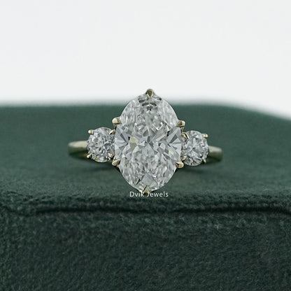 Oval and round engagement rings in a high quality 14k white gold setting