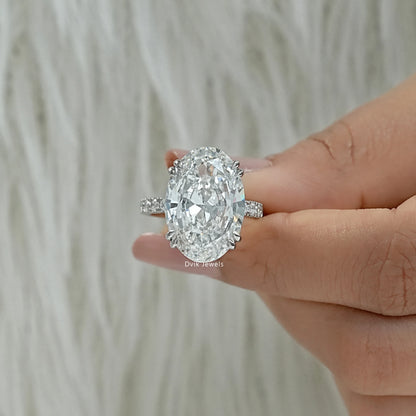 Lab created oval diamond ring close-up on a soft fabric for a sharp look