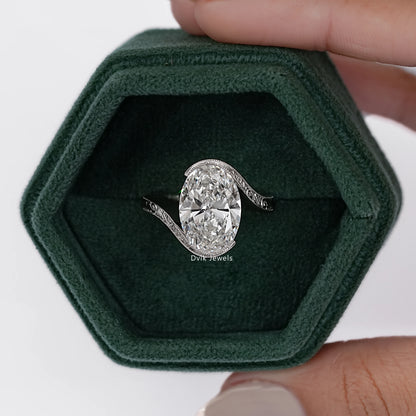 Oval Cut Diamond Filigree Bypass Ring