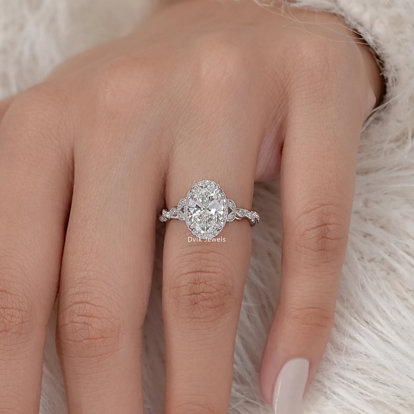 Oval Cut Accent Diamond Twisted Halo Ring