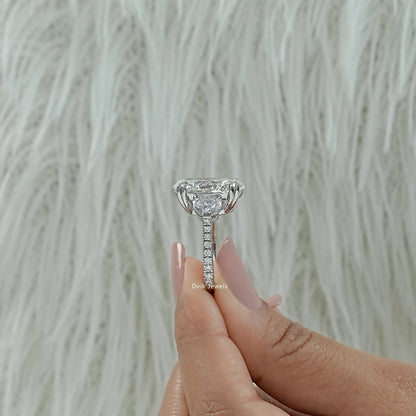 Oval engagement ring with small side stones double prong oval ring close up