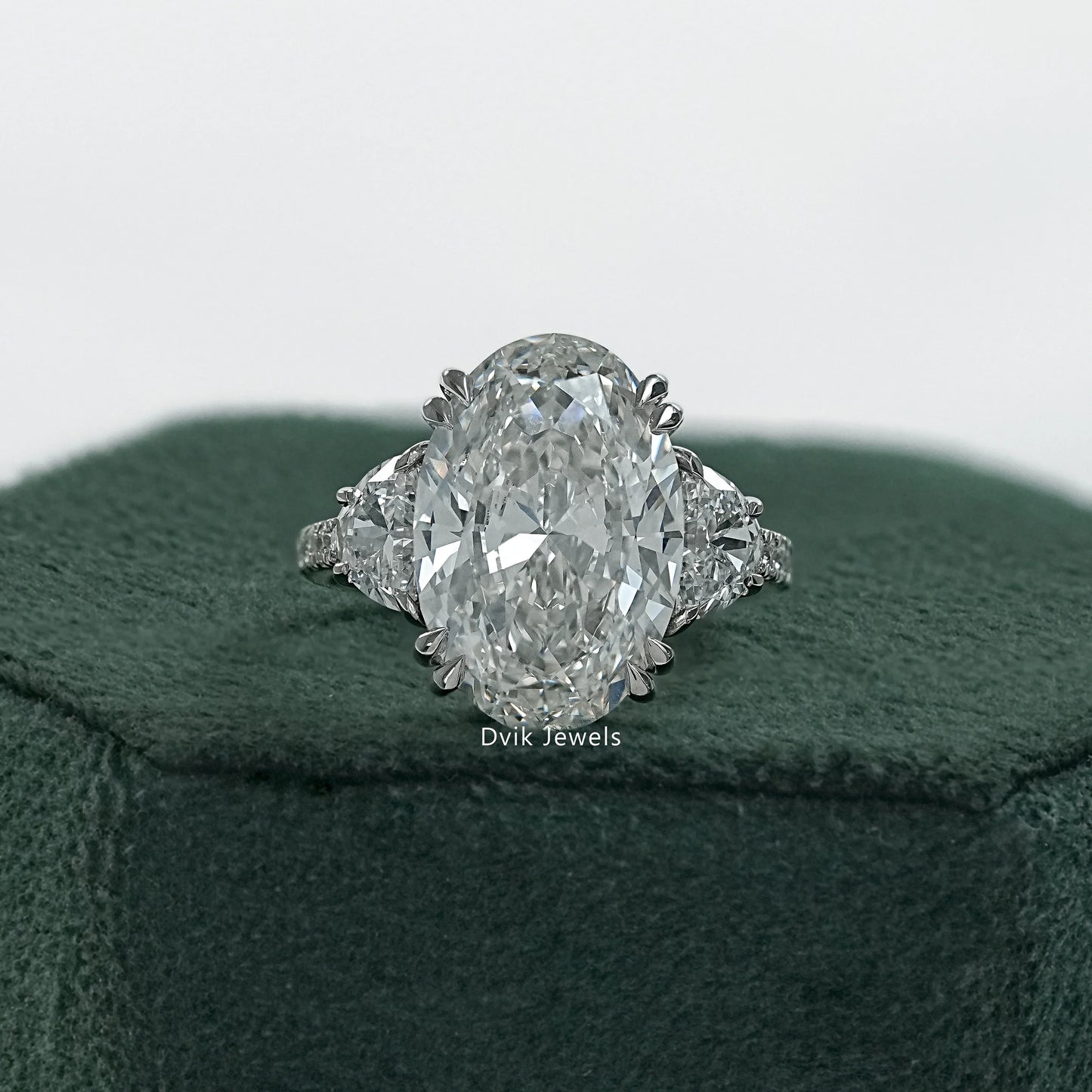 Three stone oval engagement ring white gold front view